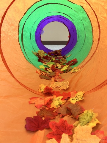 play tunnel with fabric leaves inside