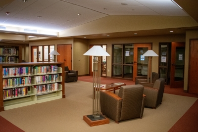Seating area with chairs and lamps outside study rooms