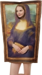 Woman dressed in costume as the Mona Lisa painting. Her face sticks out taking the place of Mona Lisa's face
