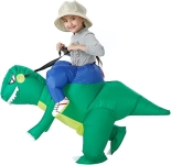 Girl wearing a dinosaur costume. The costume makes it appear as if she is sitting on top of the dinosaur holding reins