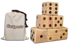 a pyramid of 6 oversized wooden dice-each shows a different number from one to six. Also shown is a carrying bag