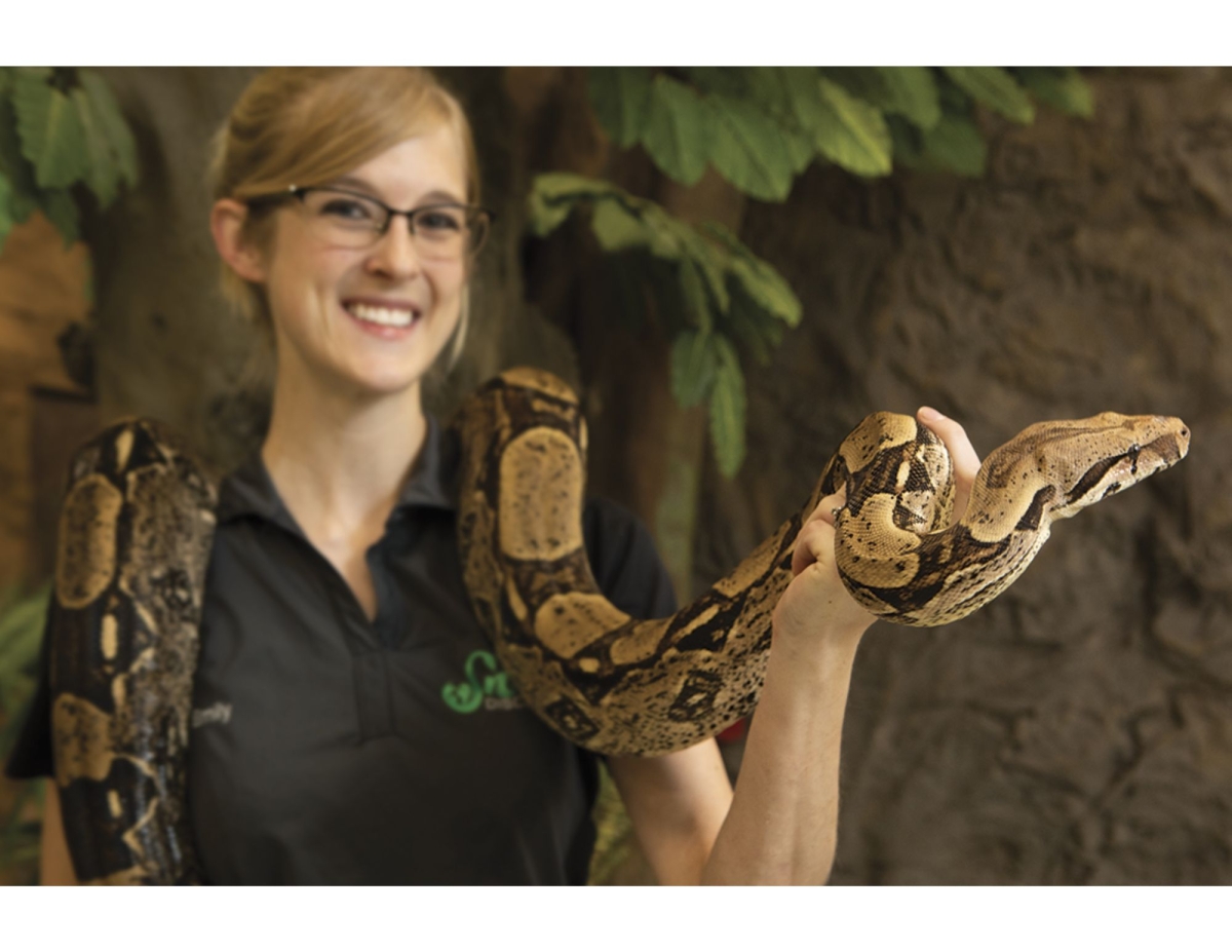 Woman holding a snake