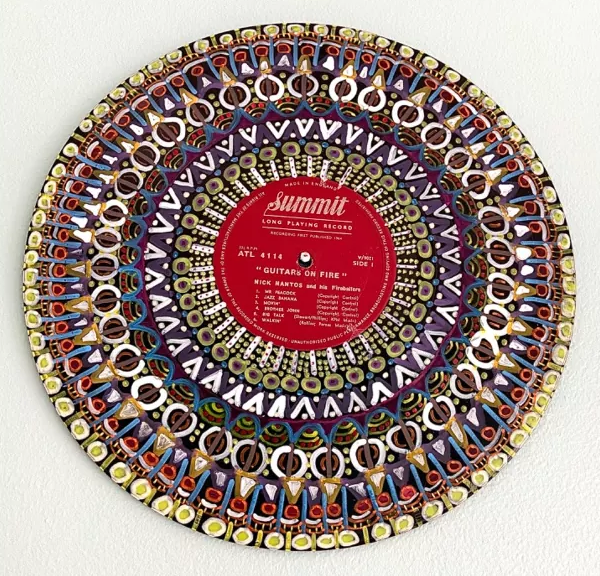 image of vinyl record decorated with mandala design