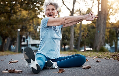 woman and arm stretches in the park