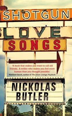 Sign that says shotgun love songs and author nickolas bulter