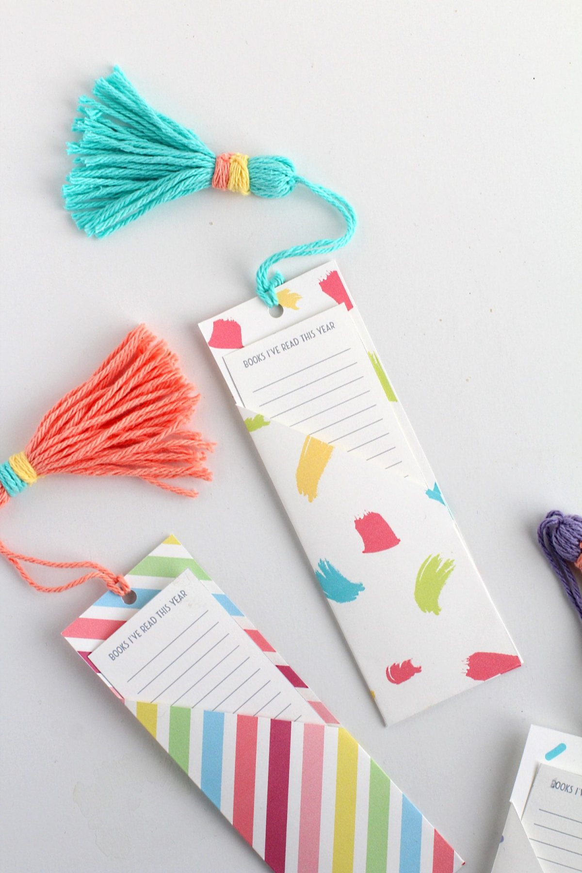 Pocket bookmarks with yarn tassels