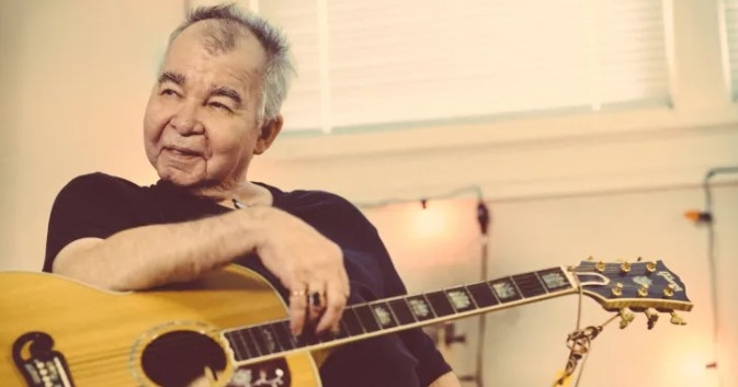 John Prine and his guitar